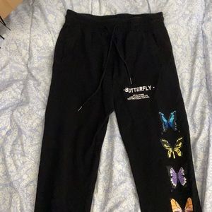 graphic butterfly sweatpants.